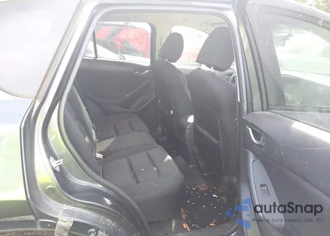 2013 Mazda Cx-5 Touring z USA, uszkodzony, nr VIN JM3KE2CE0D0112873